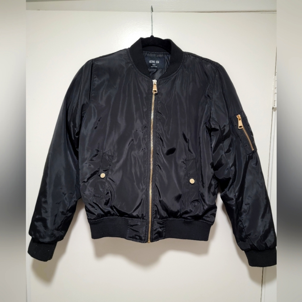 NWOT Women's Size Small (never worn) black jacket with gold hardware